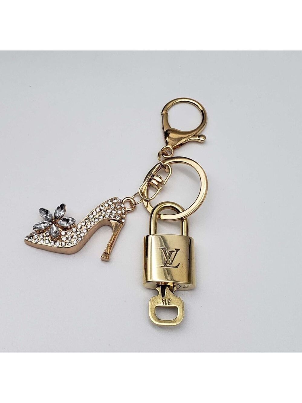 100% Auth Louis Vuitton Lock & Key with unbranded Bagcharm, Keycharm, Keychain